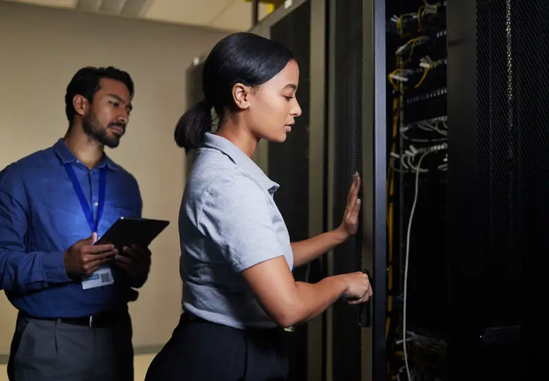LCS engineers working together in a server room